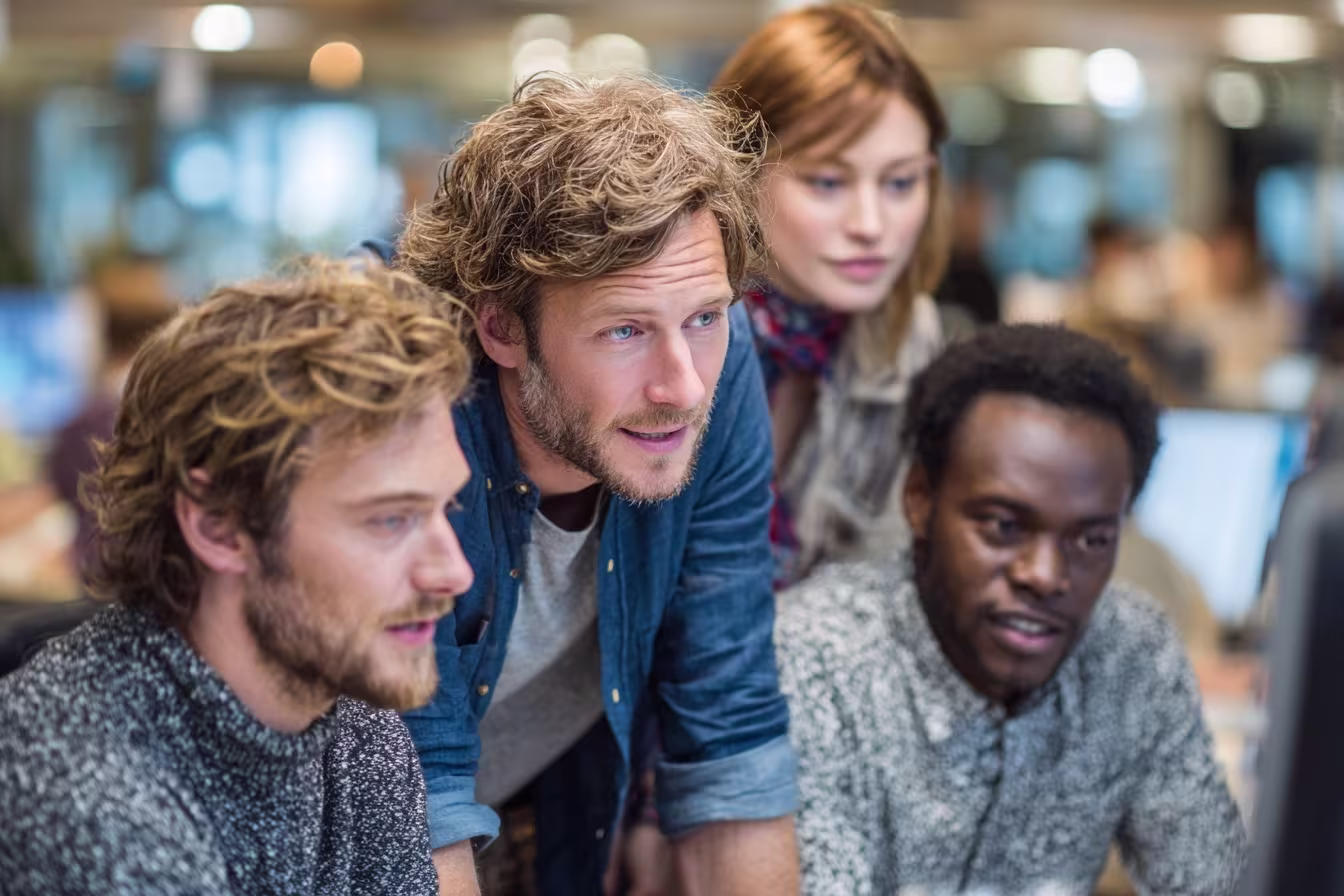 Diverse IT team discussing managed solutions