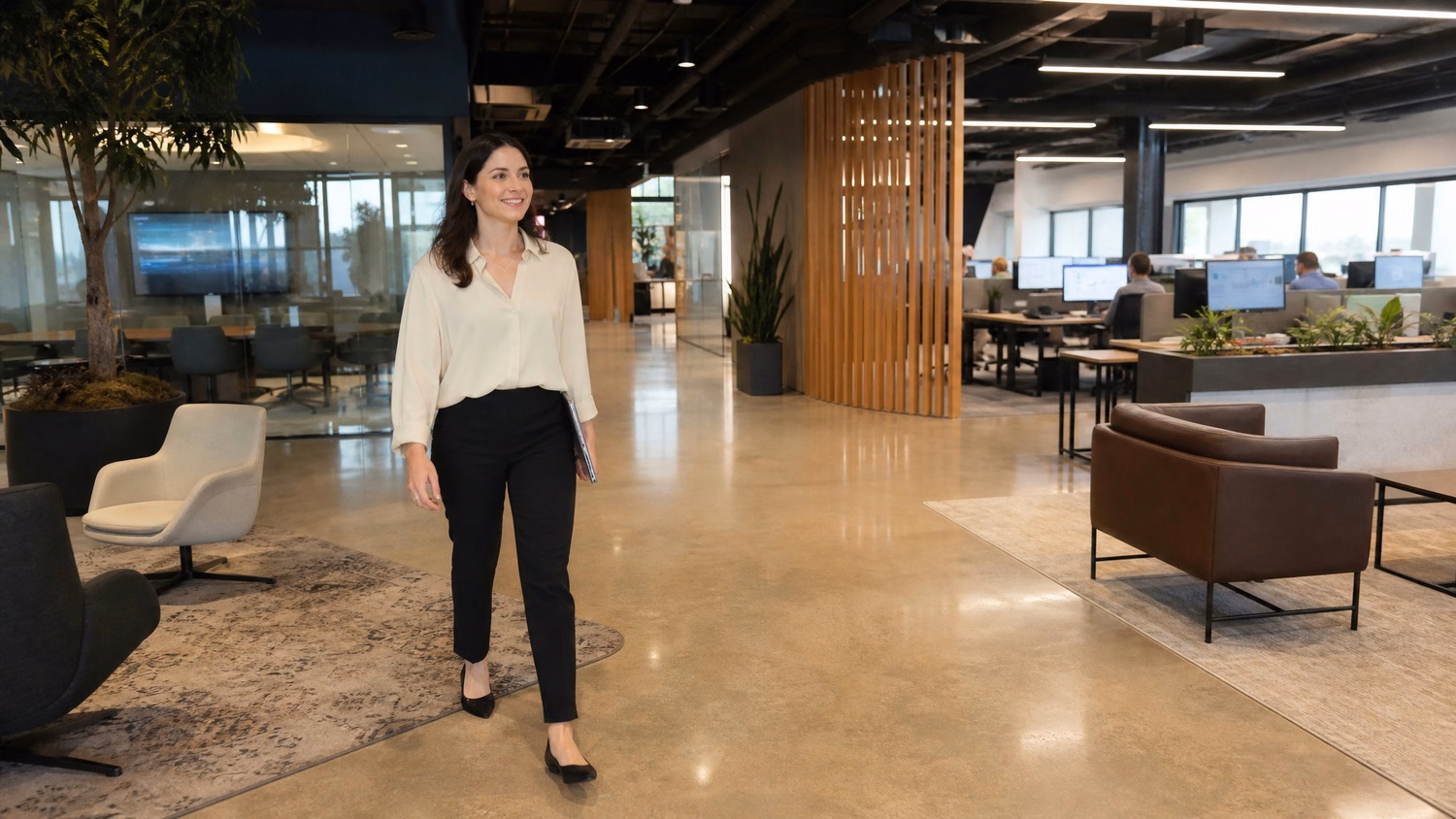 Woman walks through modern, minimalist office lobby 59 chars