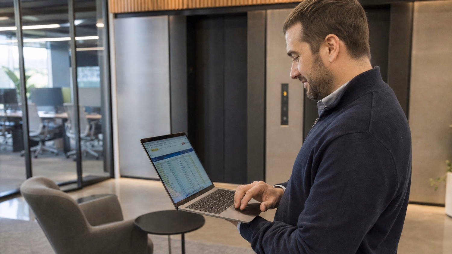 Woman reviews security checklist on tablet in office corridor 70 chars
