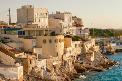 Sunlit coastal charm of Villa M Marseille, where modern Mediterranean design meets the turquoise sea, offering an authentic escape by the water.