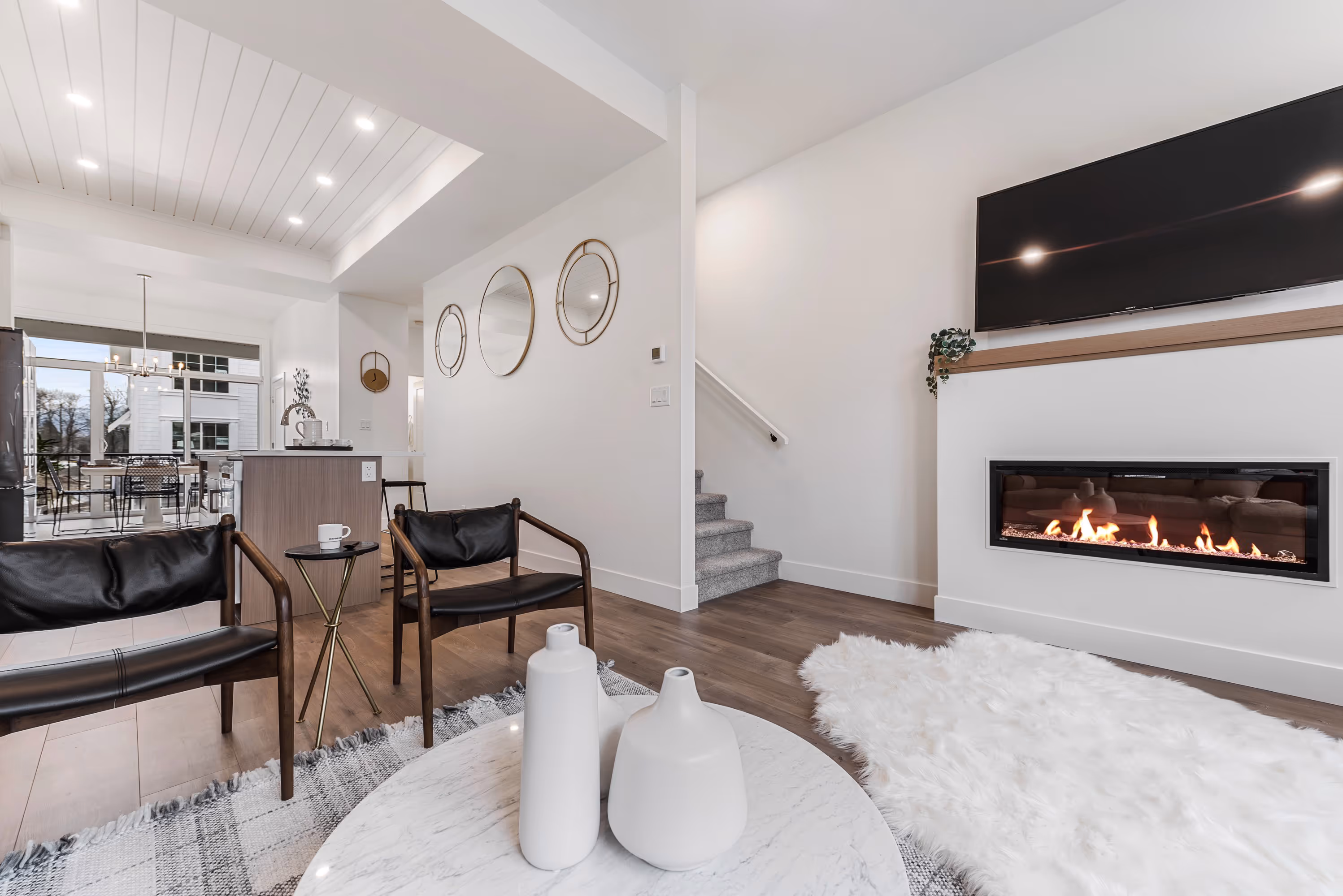 cedarbrook townhome living room featuring a fireplace and mantel