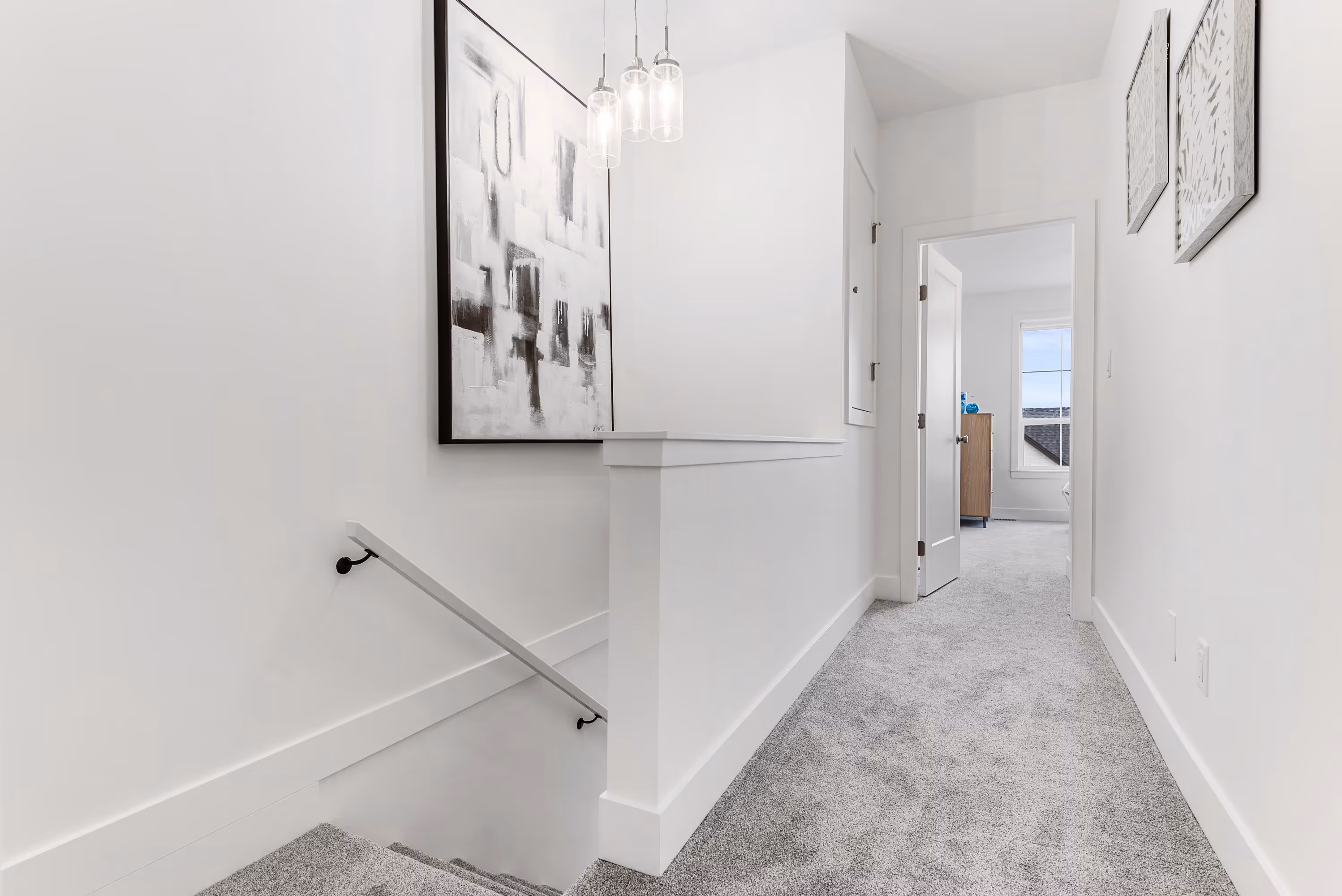 cedarbrook townhome hallway view from upstairs looking into bedrooms