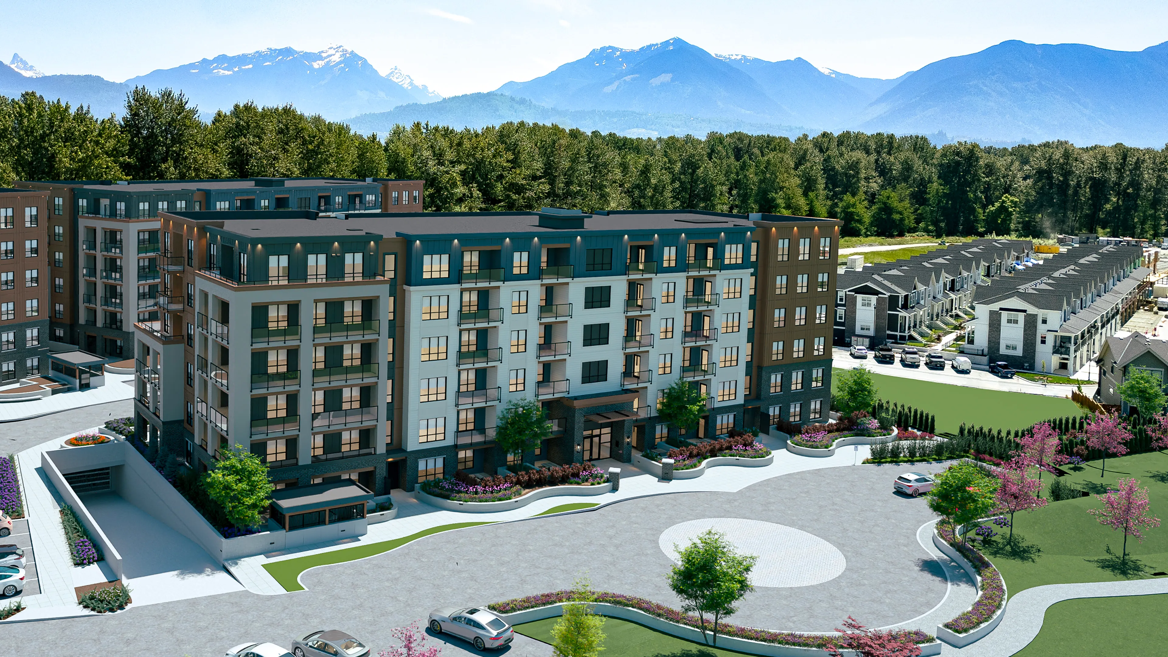 Modern multi-story apartment buildings with balconies under a partly cloudy sky.