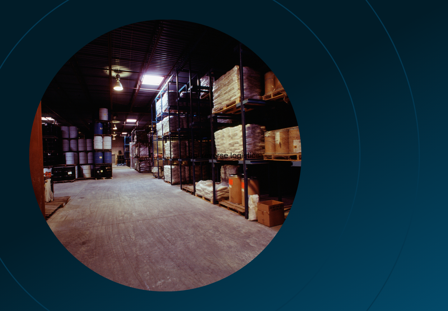 Pallets of barrels and wrapped inventory stacked on shelves in a warehouse