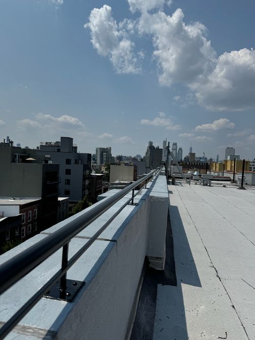Security bar on exterior roof of building.