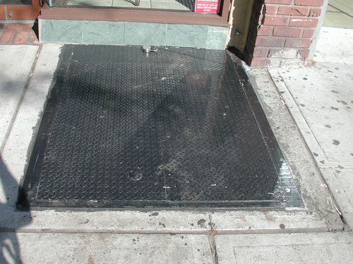 Solid iron cellar doors.