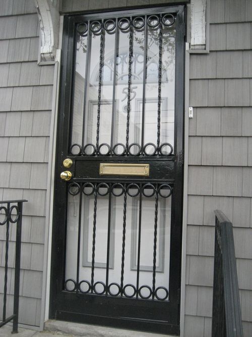 Metal bar security door for residential building.