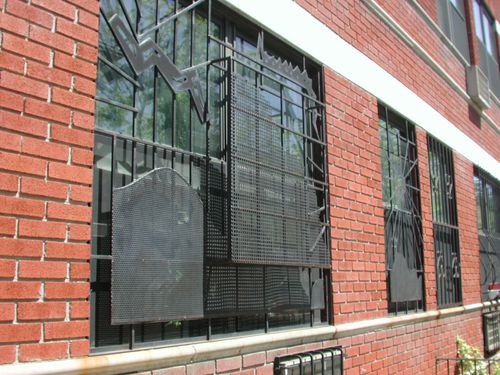 Decorative artistic metal window guard NYC.