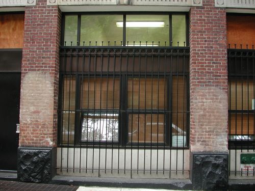 Window protection bars for street-level windows.