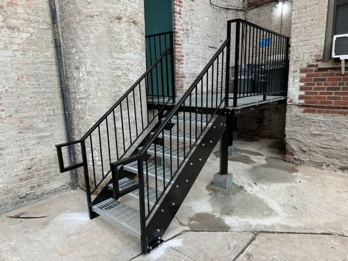 Outdoor metal staircase with railing