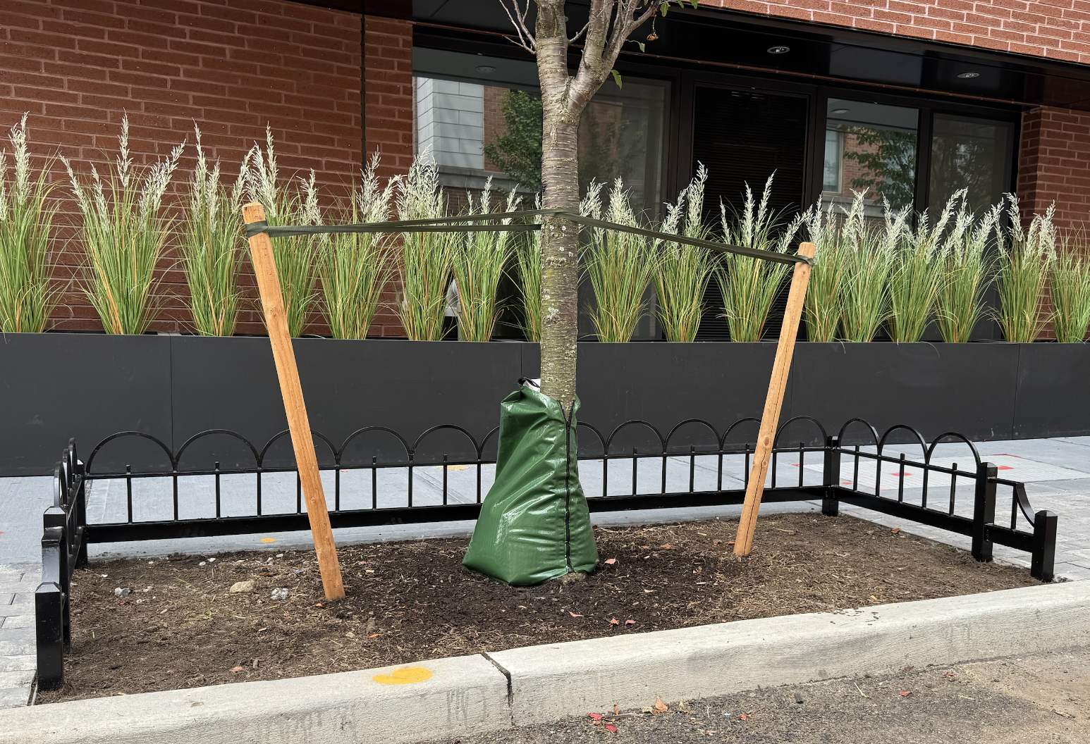 TG041 NYC Parks Recommended Style A (Front), hoops with alternating vertical pickets, solid bar corner posts with chamfered pyramid top 