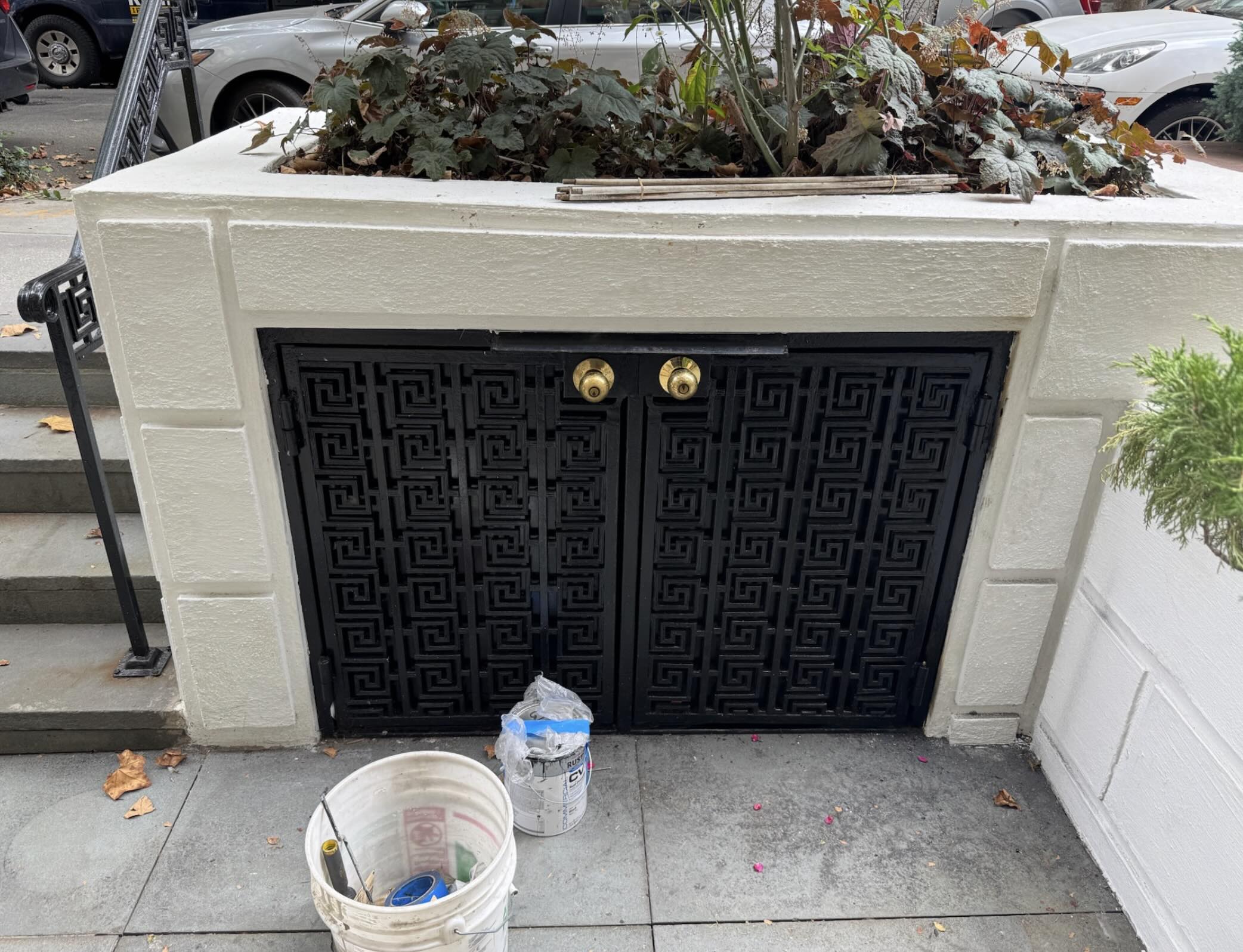 E026 Double enclosure door with Greek key fretwork design