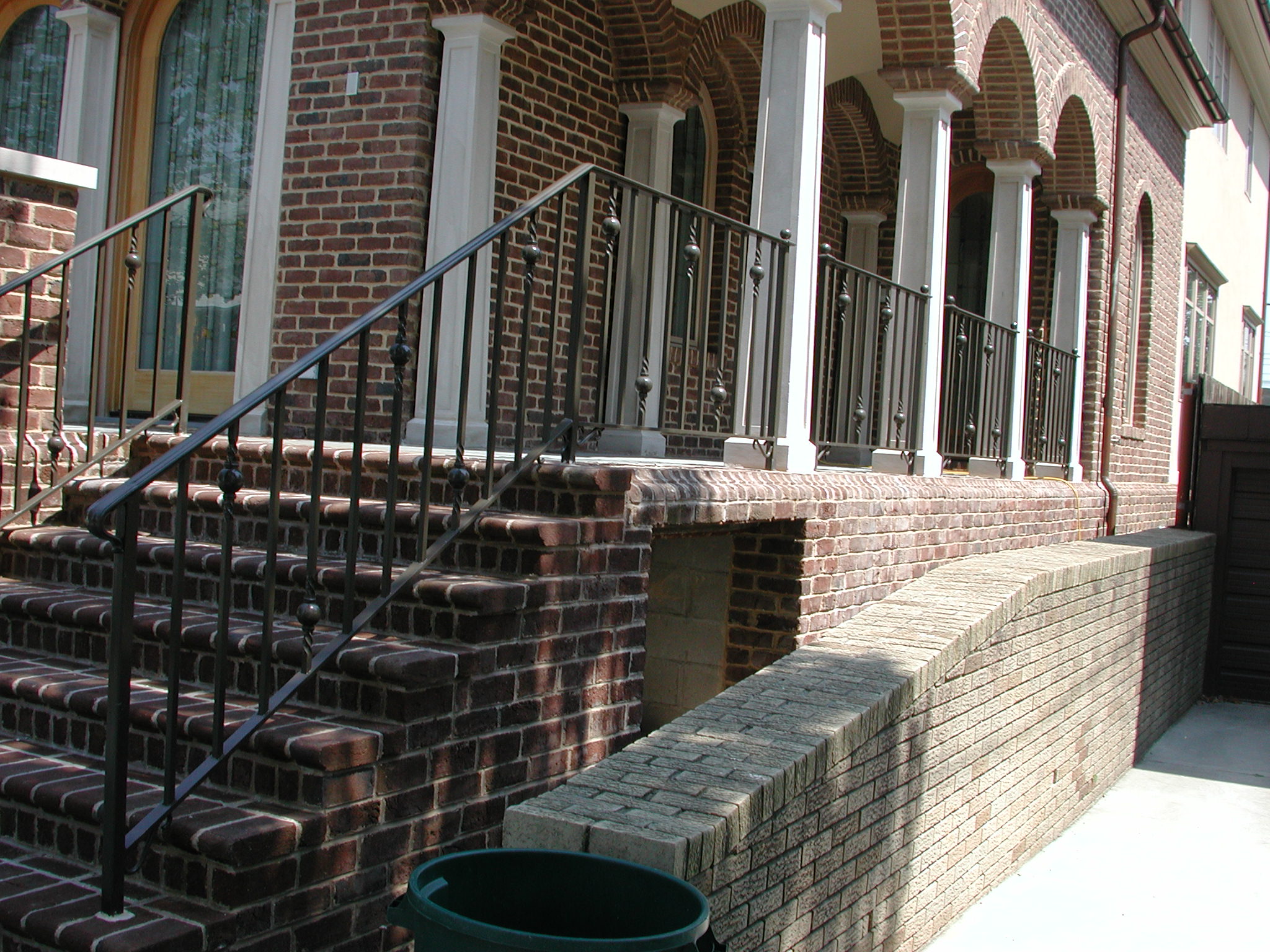 R219 Iron railing features evenly spaced vertical pickets accented with decorative ball elements