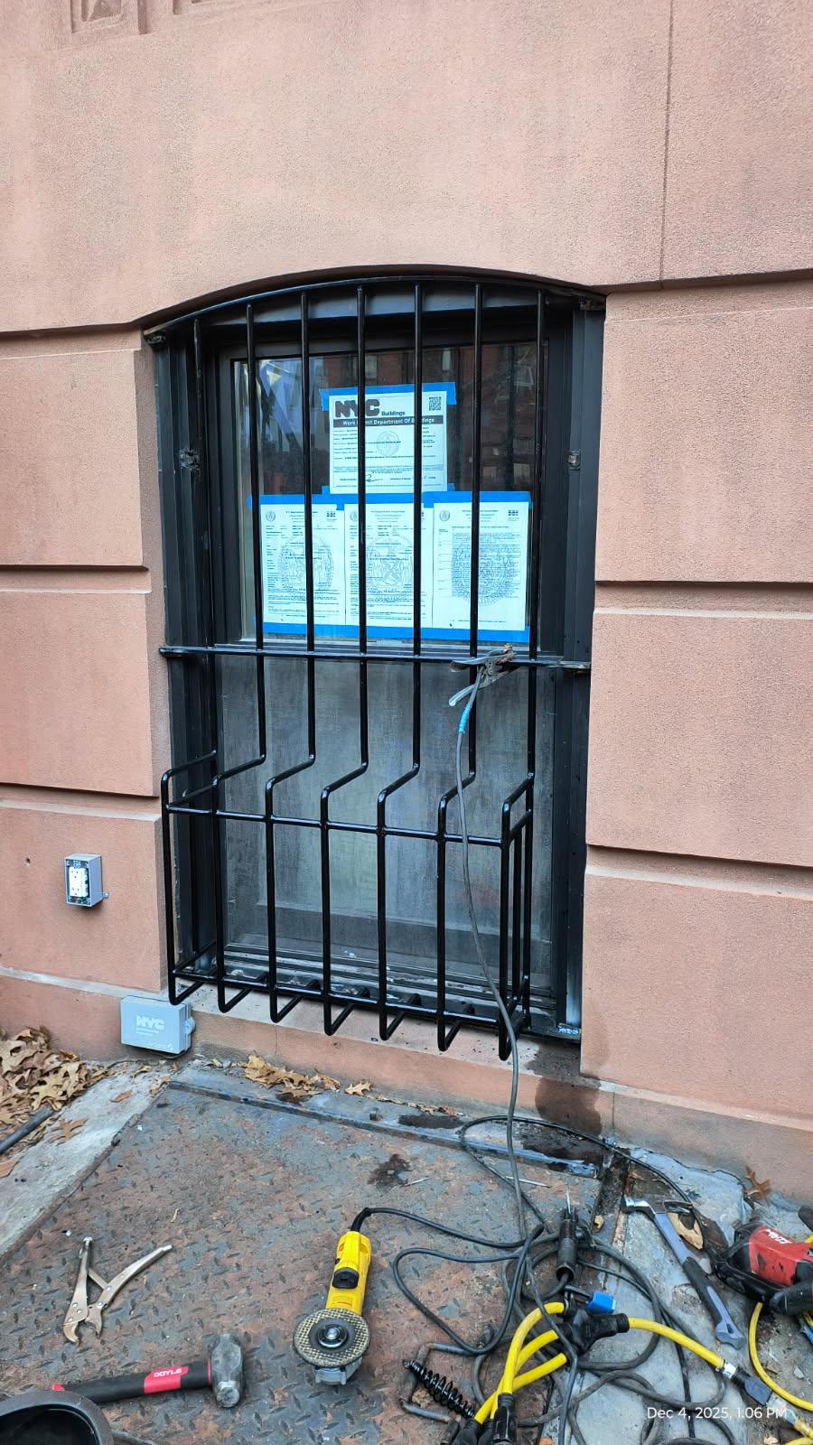 GU156 Window Grille made with round bars with arched top and AC bump out. 