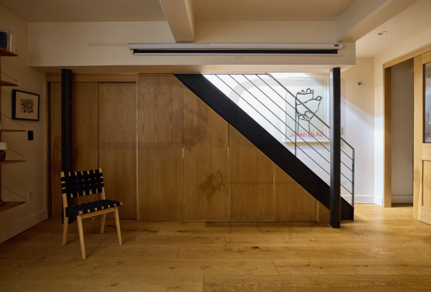 Alternate angle of the severe millwork staining before expert restoration