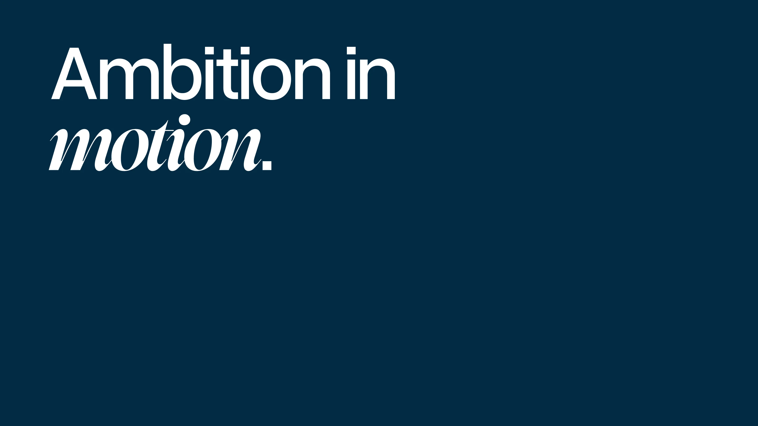White text on dark blue background reading 'Ambition in motion.' with the word motion in italics.