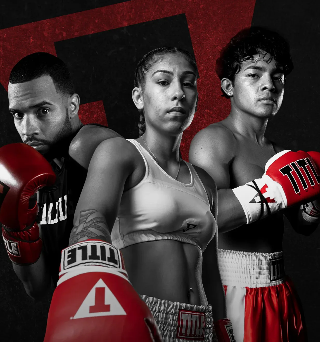 TITLE Boxing lifestyle photo of three boxers posing in red TITLE gloves and gear.
