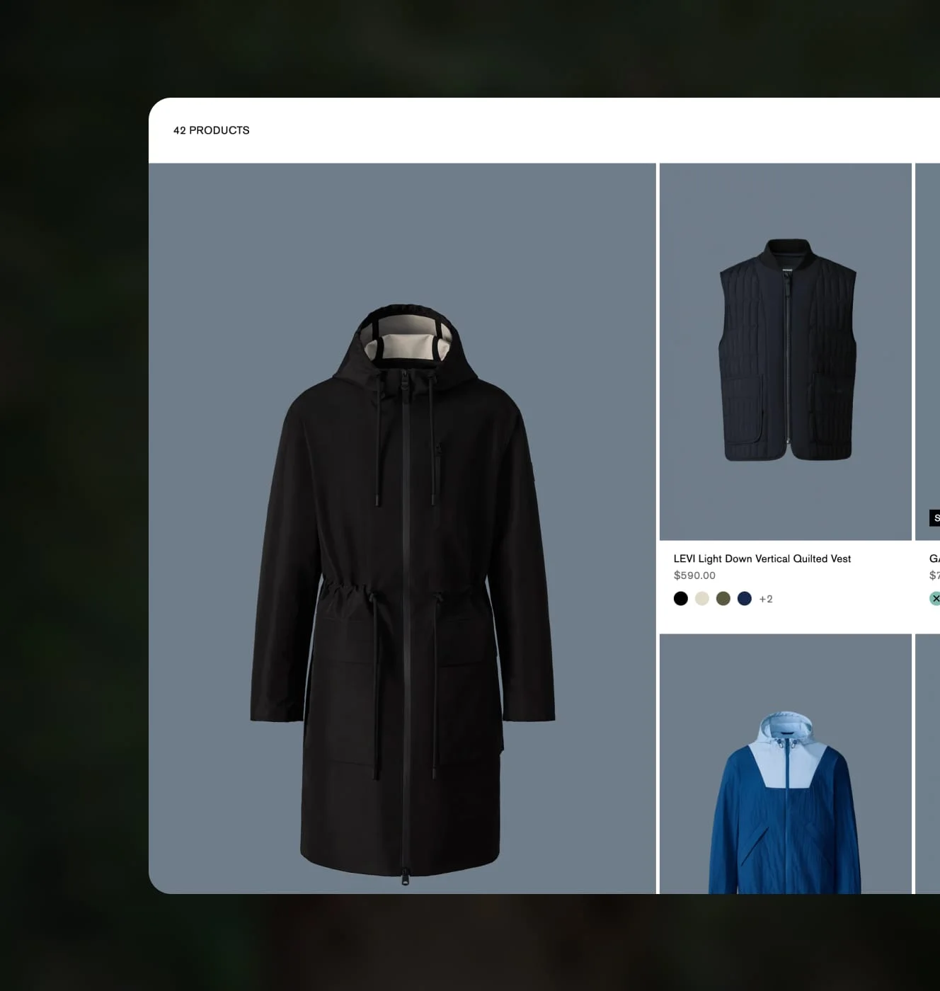 Mackage collection page grid showing a black hooded parka, a quilted vest, and a blue jacket.