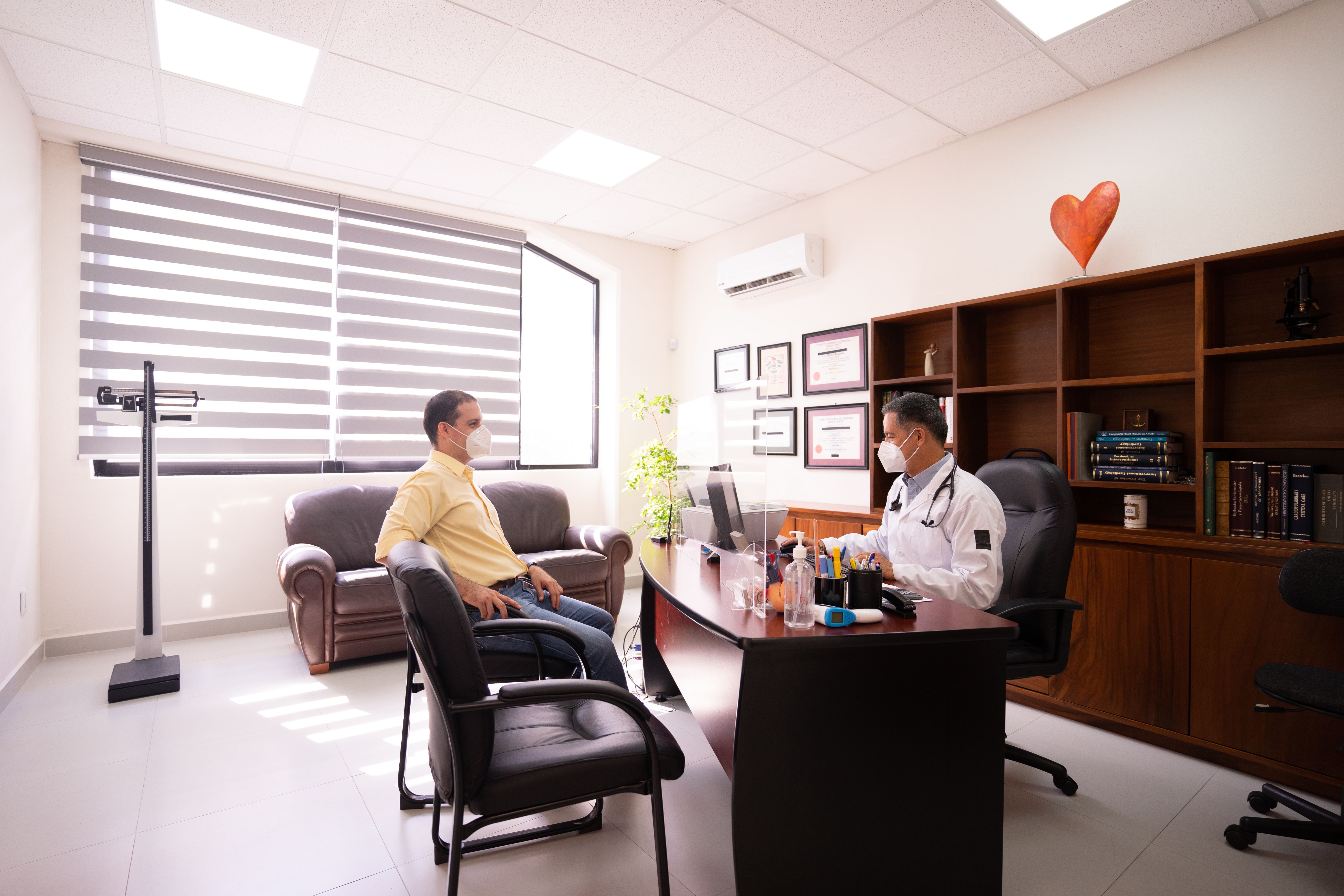 Patient consulting with a doctor at a medical office