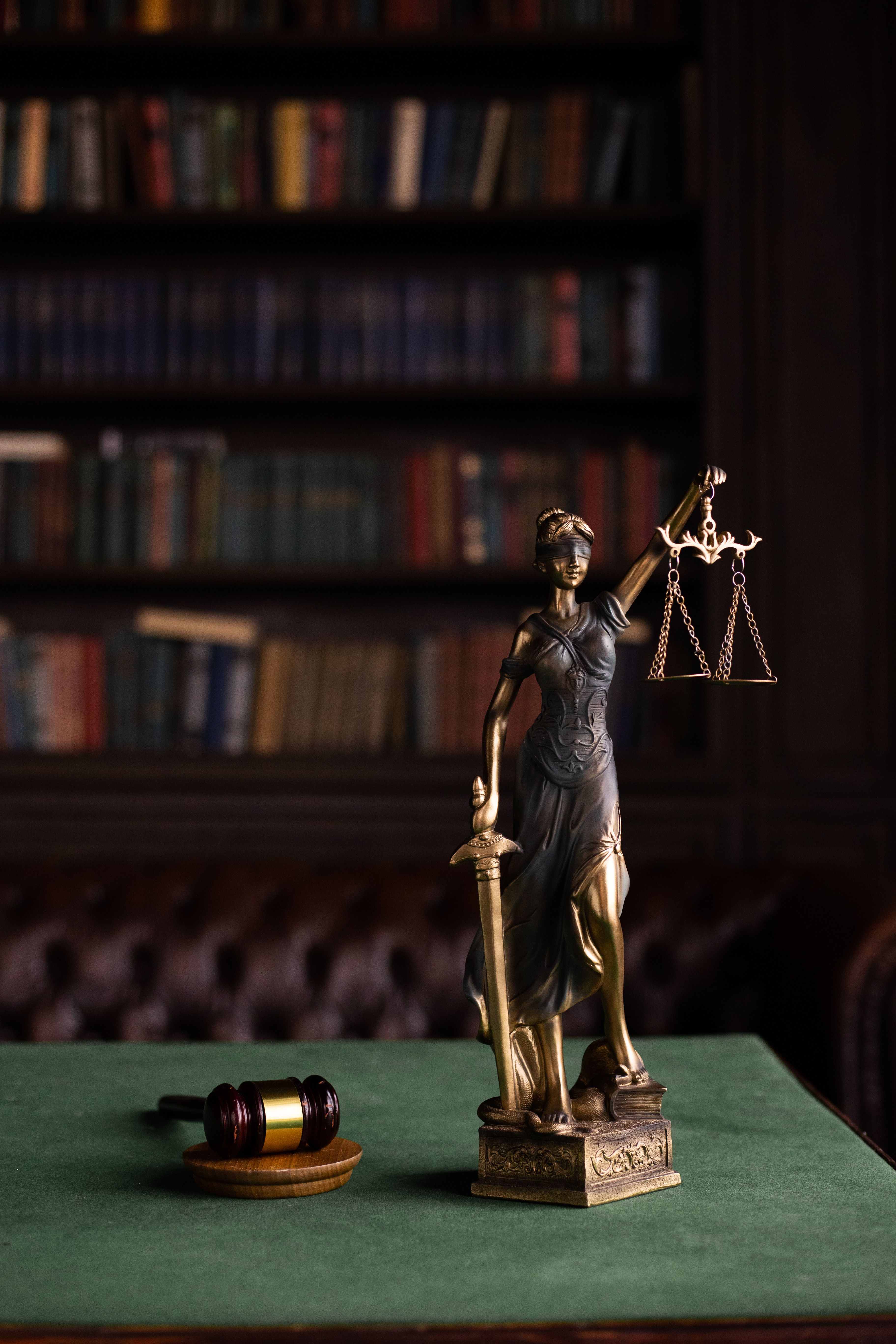 Lady Justice statue and a gavel