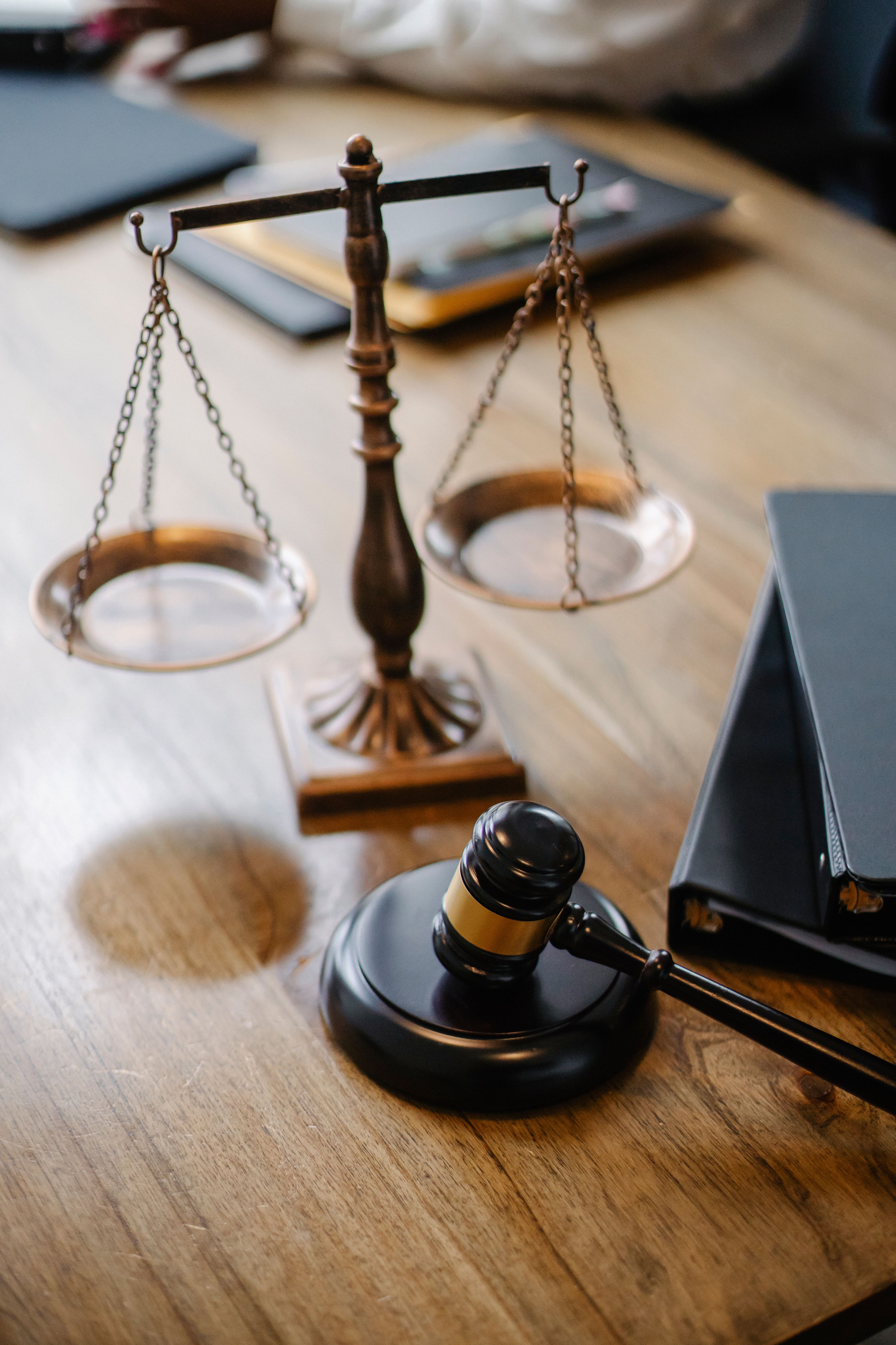 Judge's desk with a gavel and scales of justice