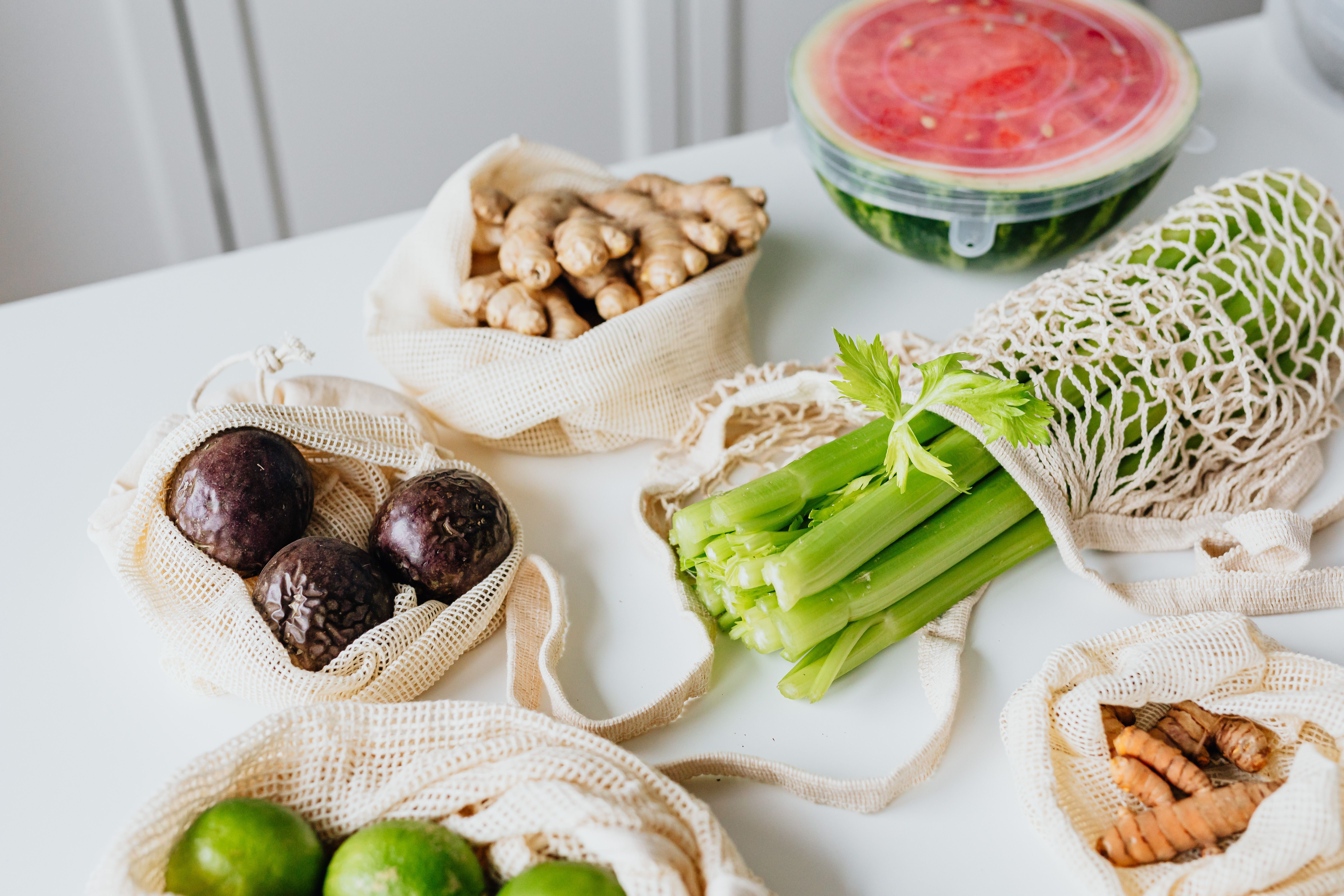 Fresh vegetables and fruits arranged on a table