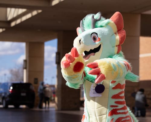 A dragon fursuiter in the fursuit parade