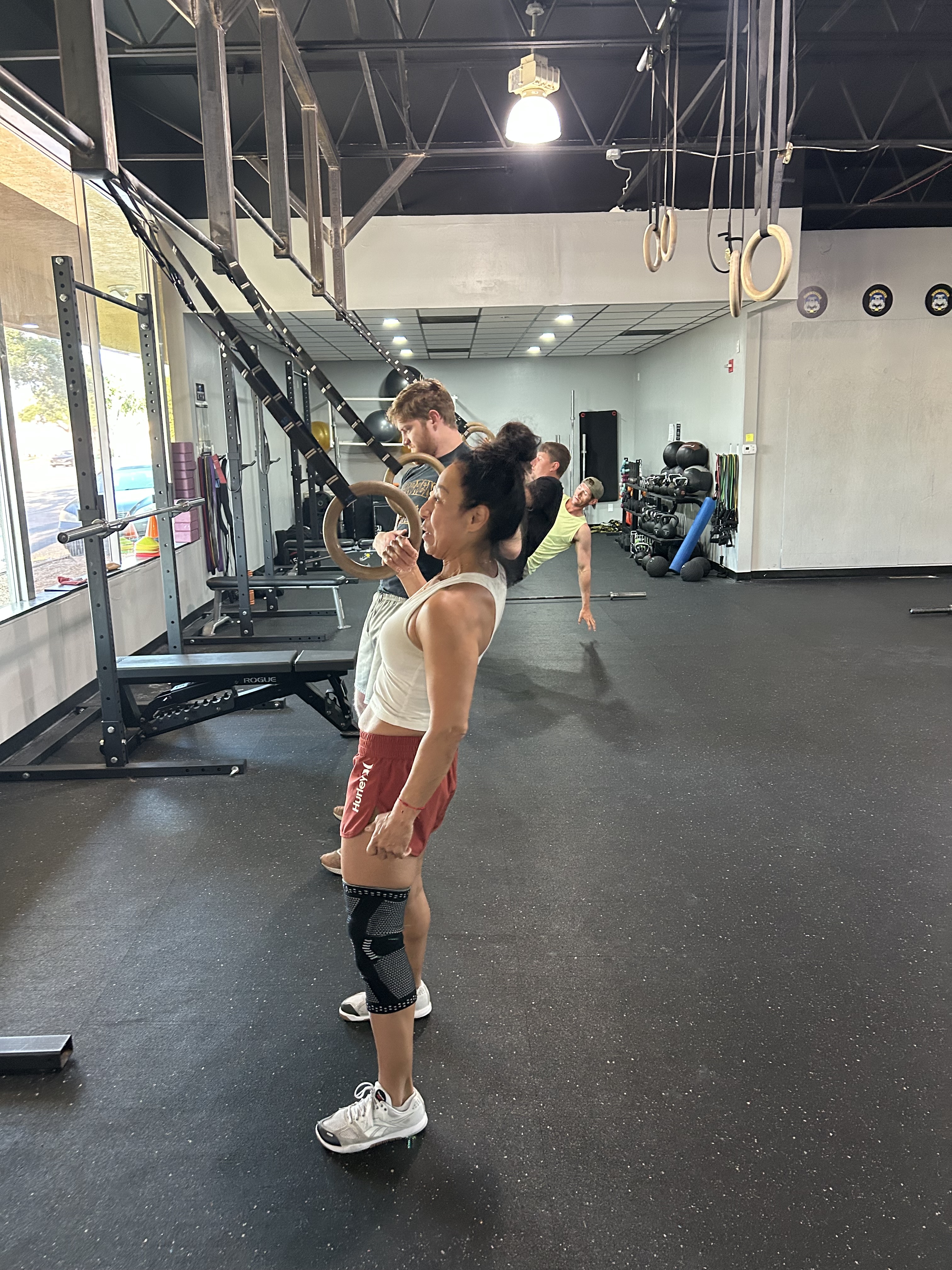 Photo of a client doing a trx row