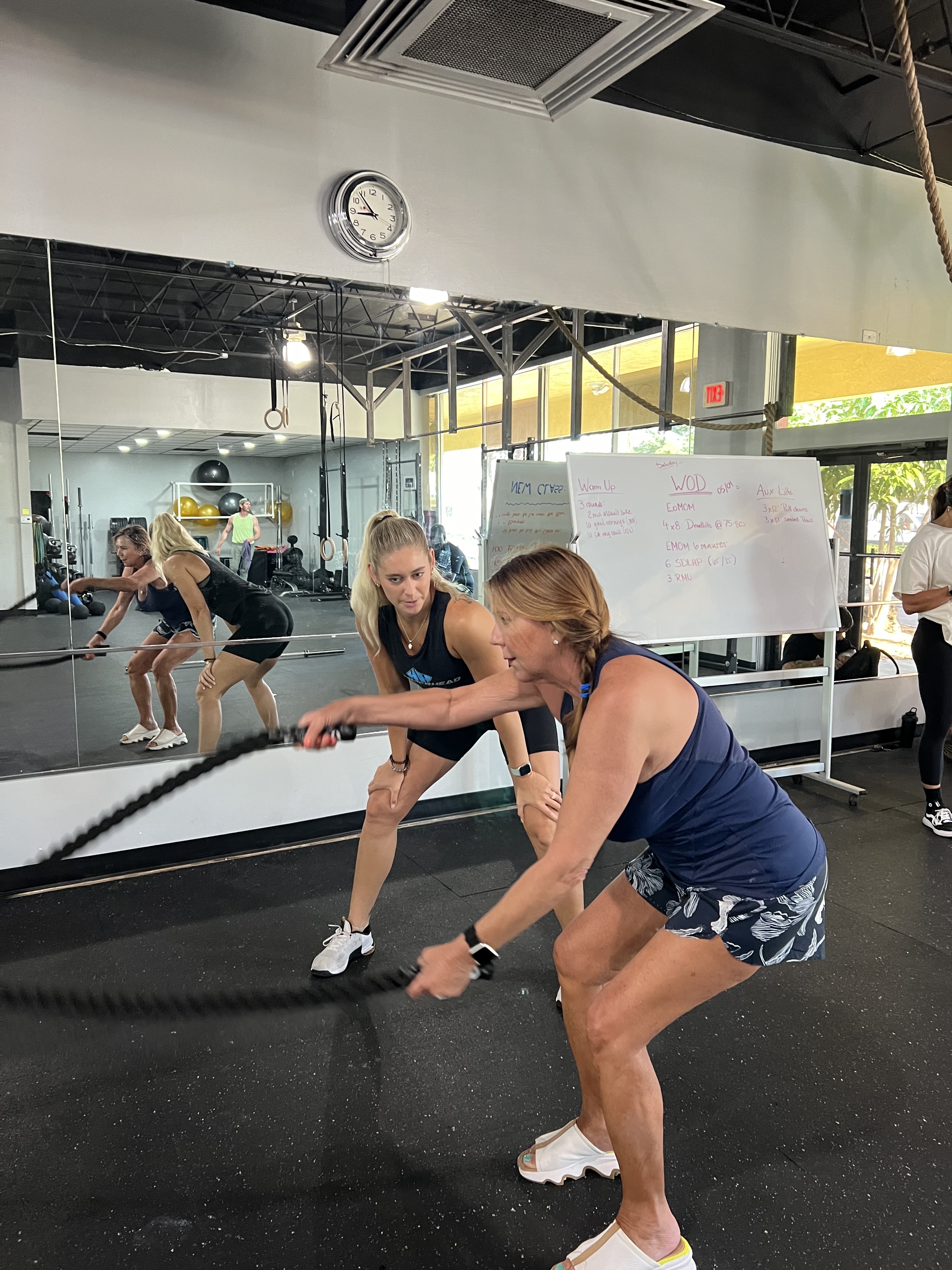 client doing battleropes