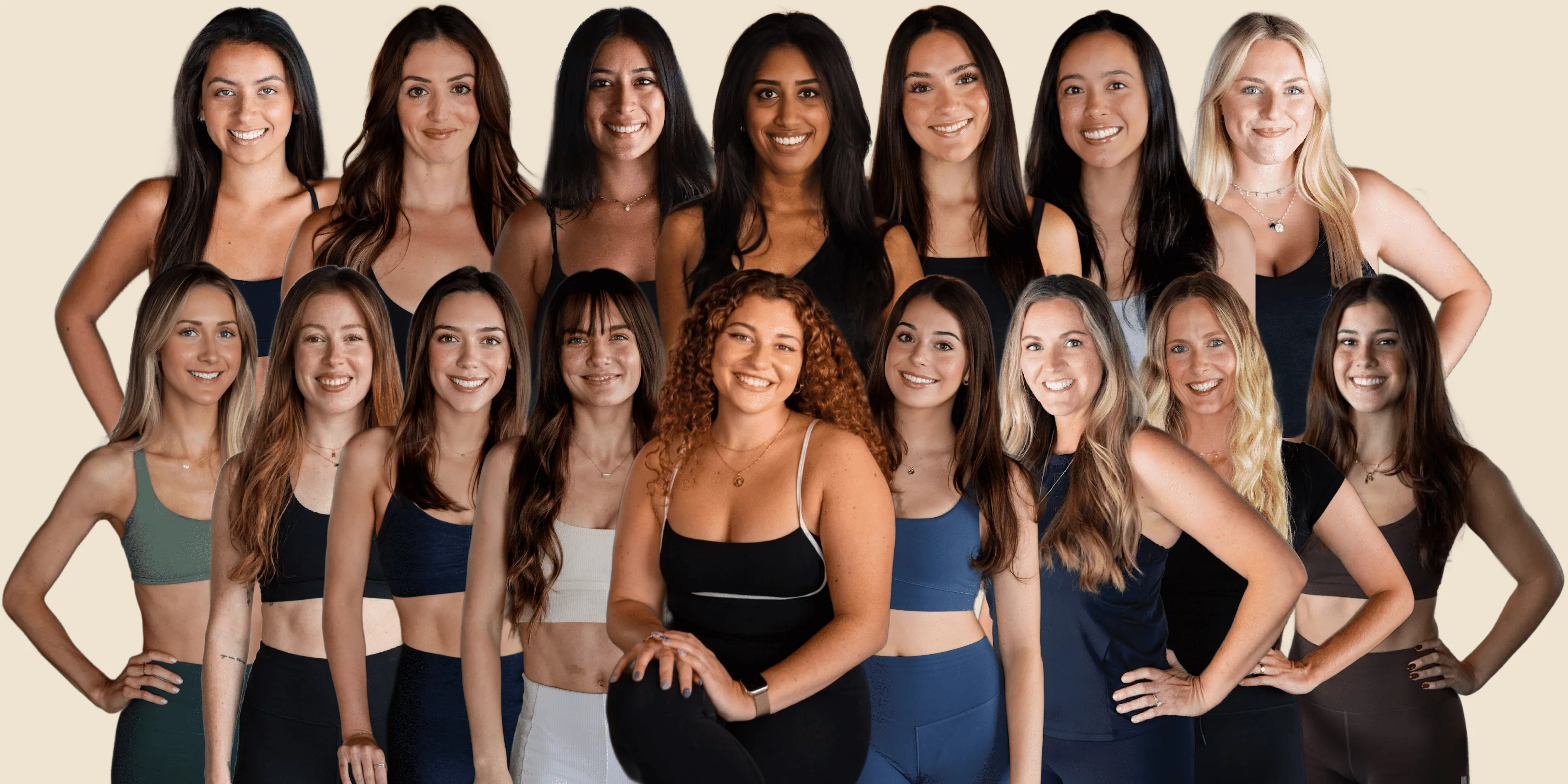 Group portrait of fifteen smiling women in athletic wear against a beige background.