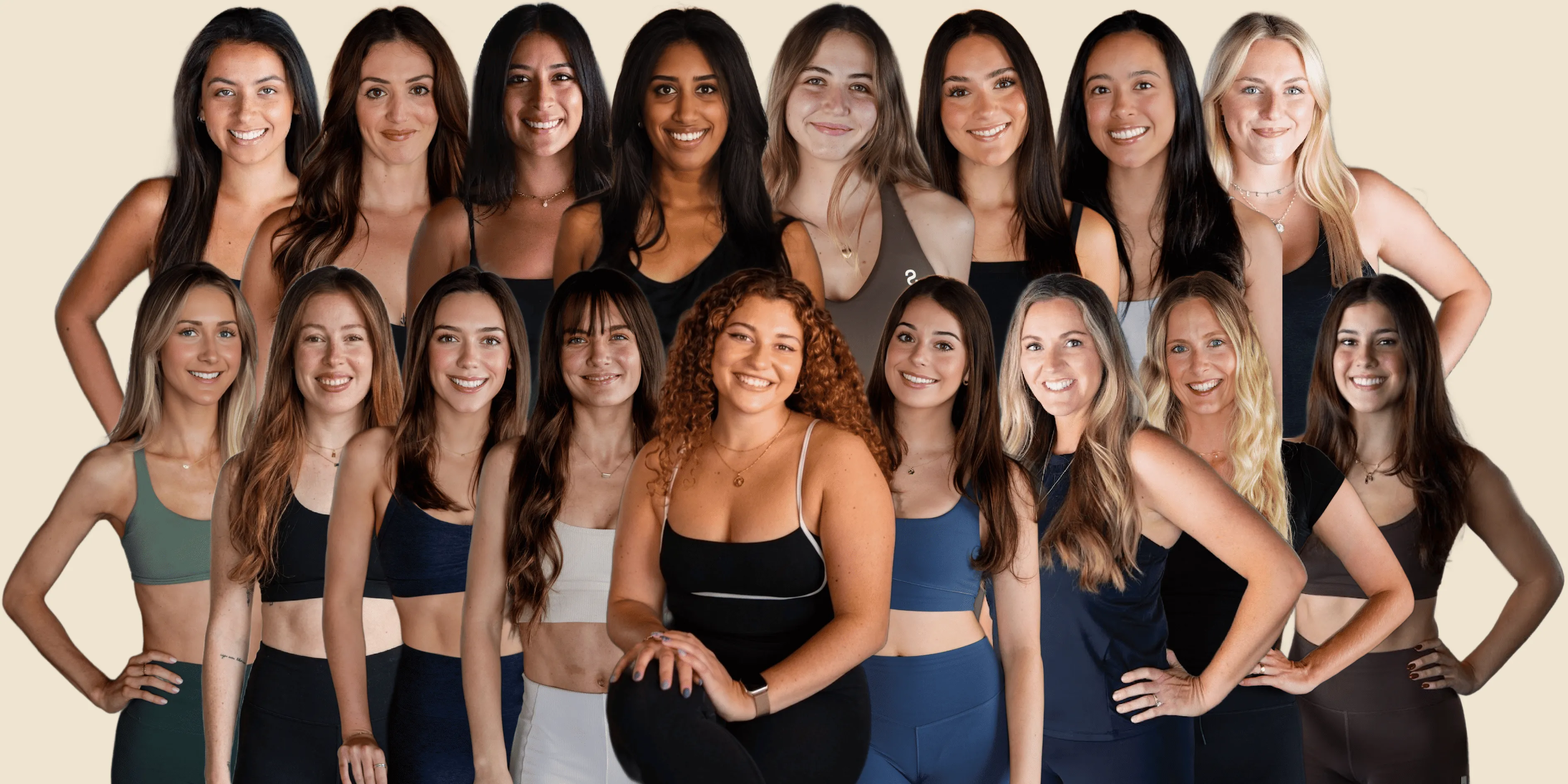 Group of 16 smiling women in athletic wear posing against a plain beige background.