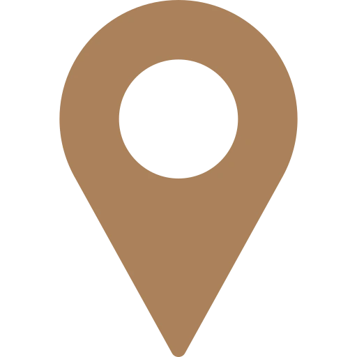Simple brown location pin icon with circular cutout in the center.