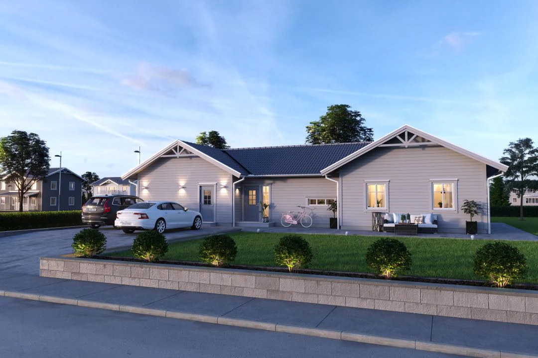 Modern kustnära villa i Hällevik med svart tak och ljus fasad.