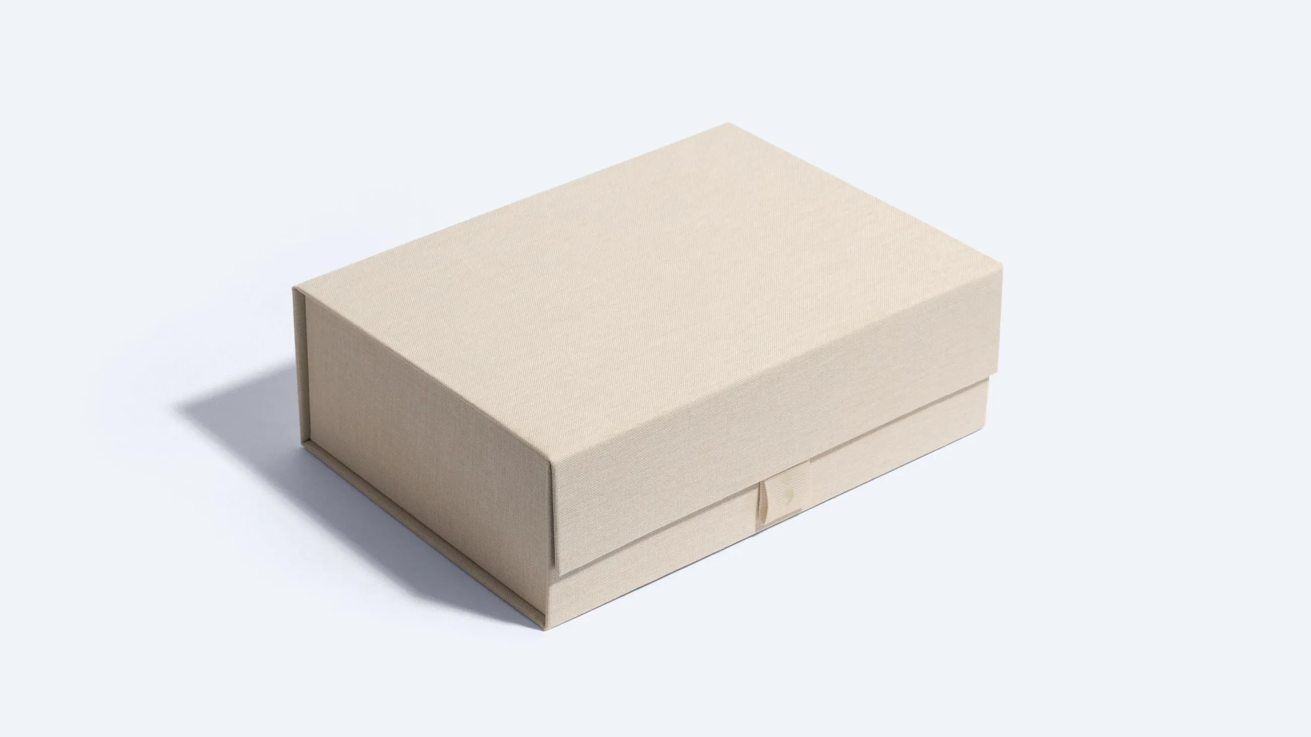 Beige collapsible rigid box closed, highlighting its clean and minimal design.