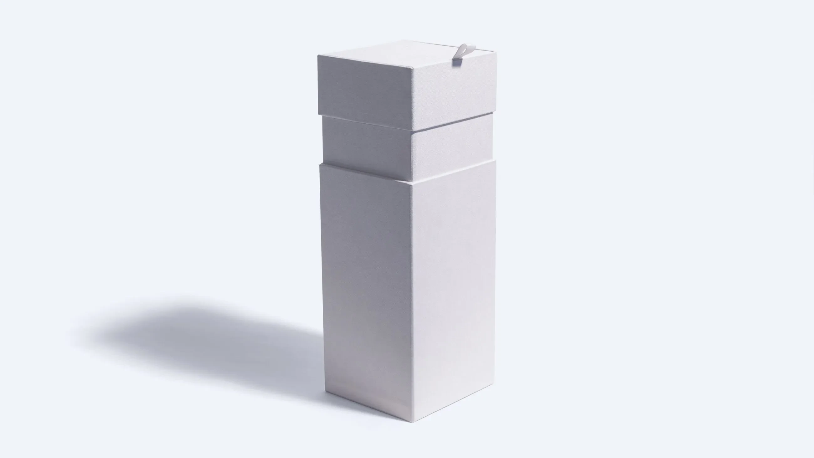 Tall rectangular hinged lid box in plain white with a ribbon pull tab.
