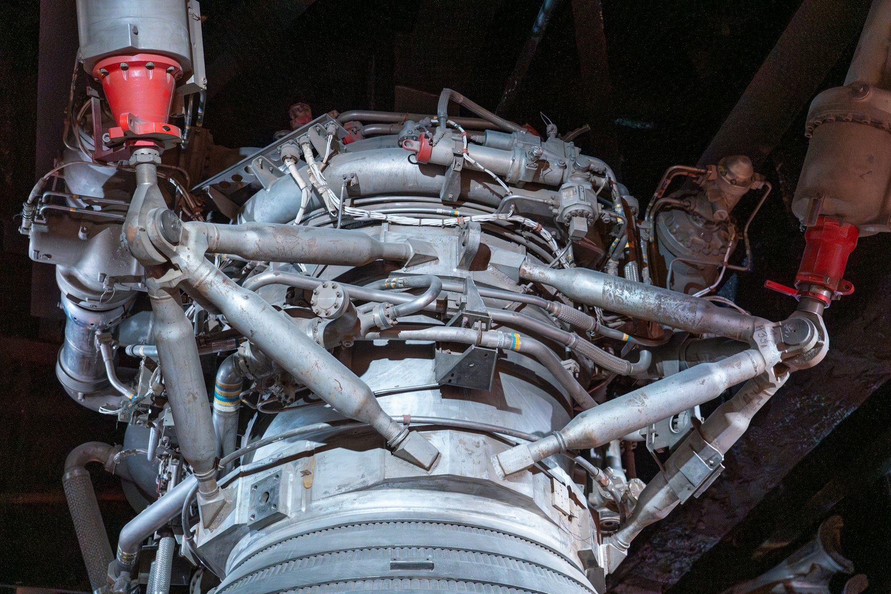 Close-up of rocket engine plumbing and precision hardware
