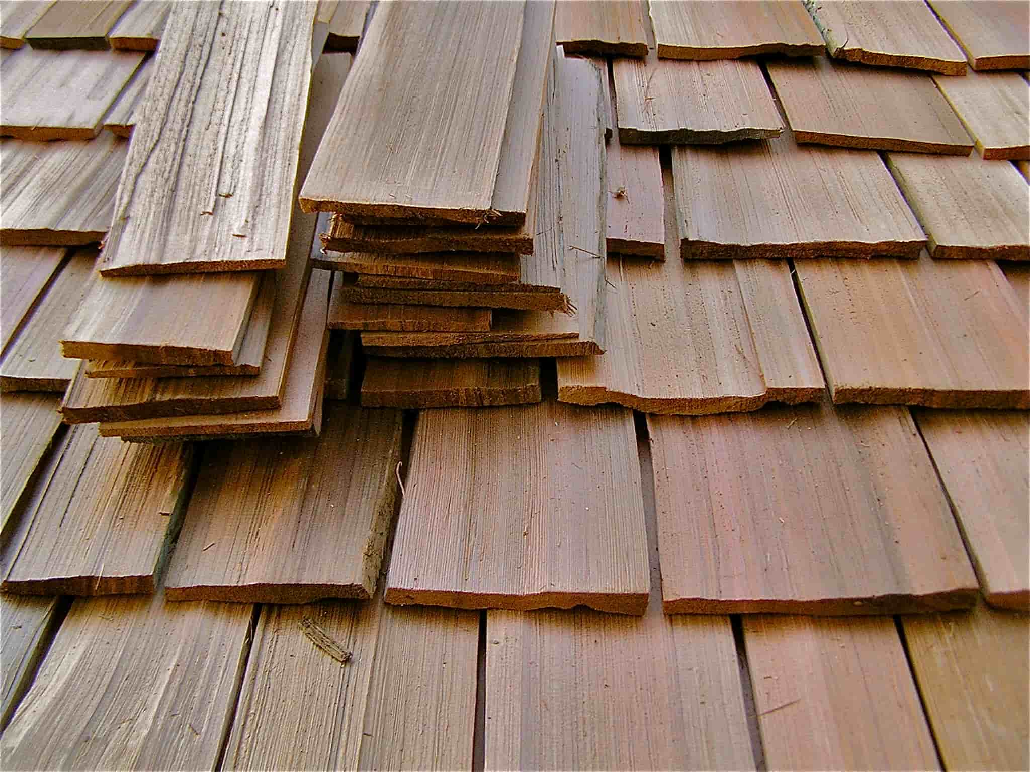 Natural cedar wood shake roofing materials prepared for residential roof installation
