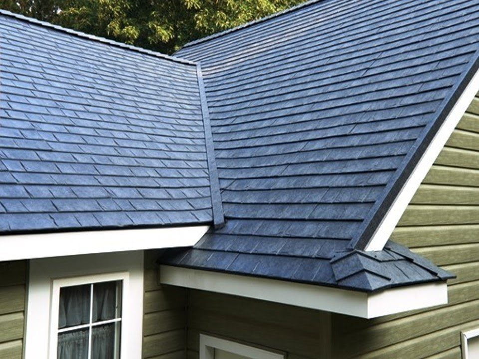 Premium slate roofing system installed on a residential home for long-lasting weather protection