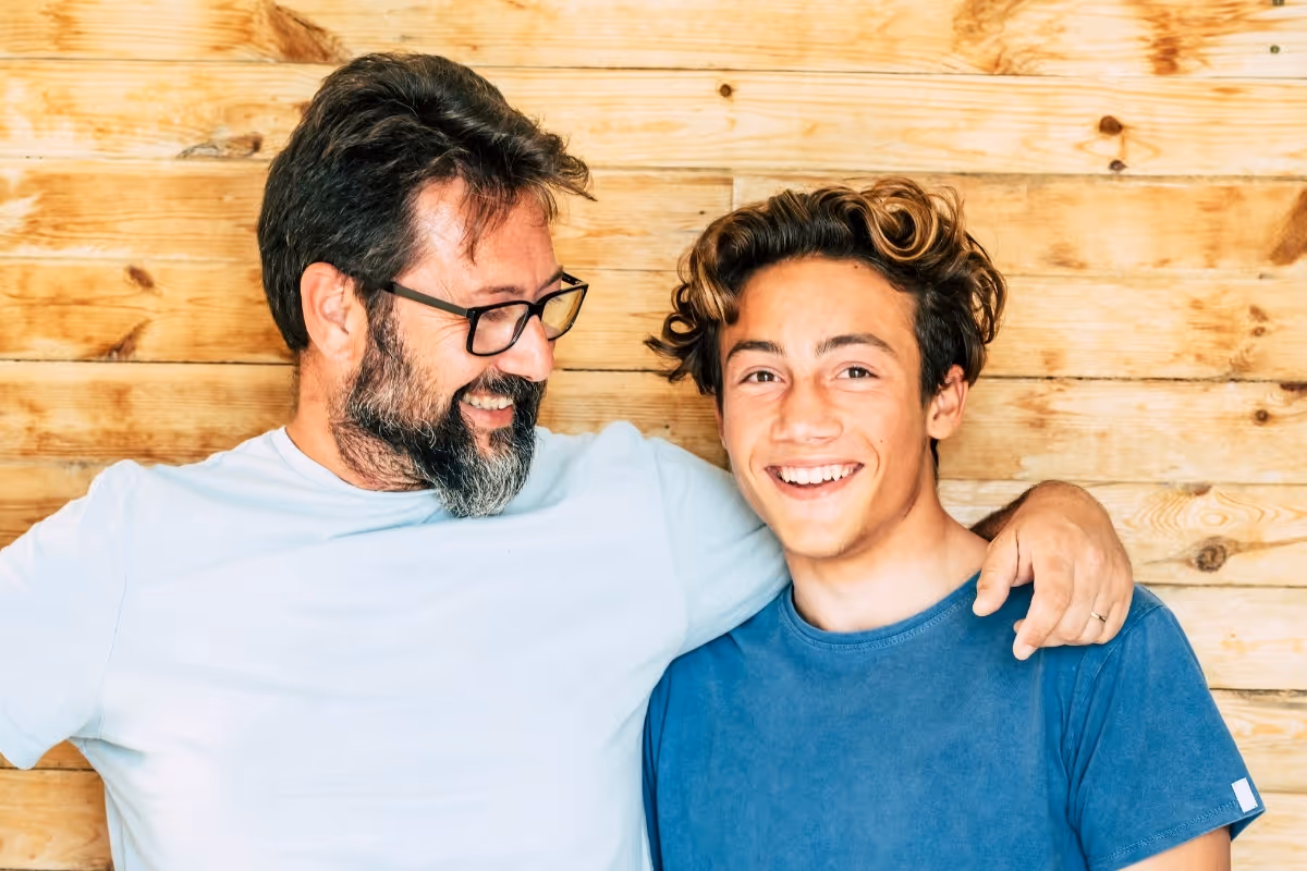 a boy and his father or mentor