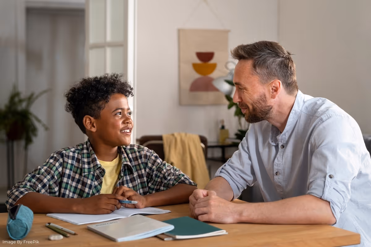 male talking with a boy