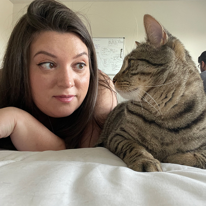 Macee playing with cat