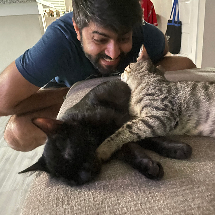 adnan playing with cat