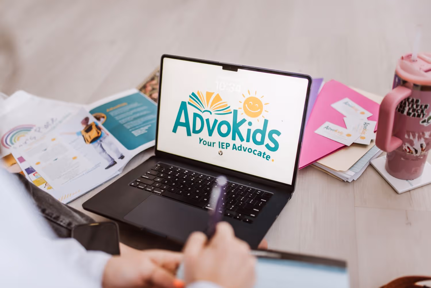 Mindy discussing Advokids with her client.
