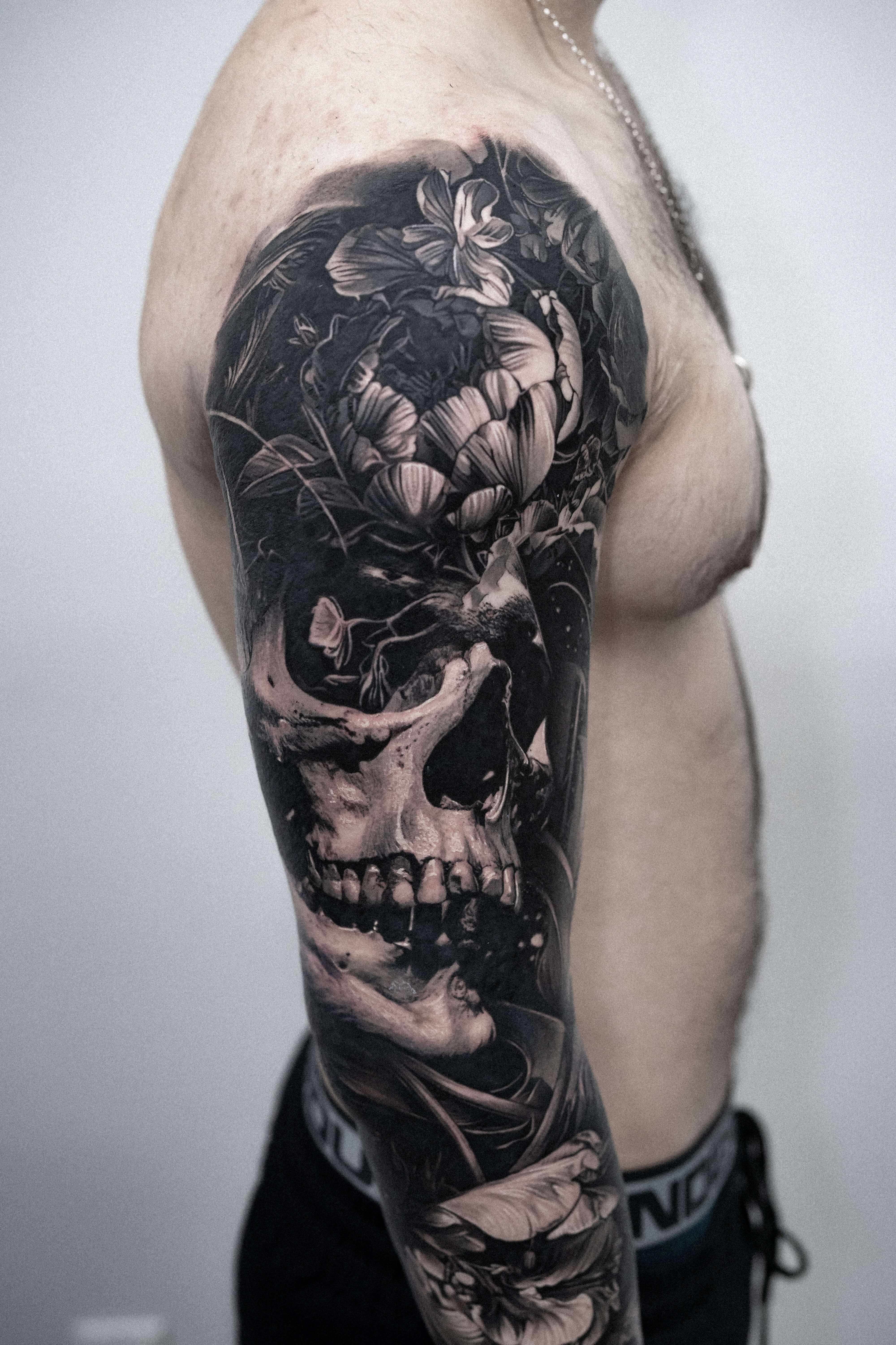 Realism tattoo black and grey portrait — Monolith Studio Brooklyn NYC