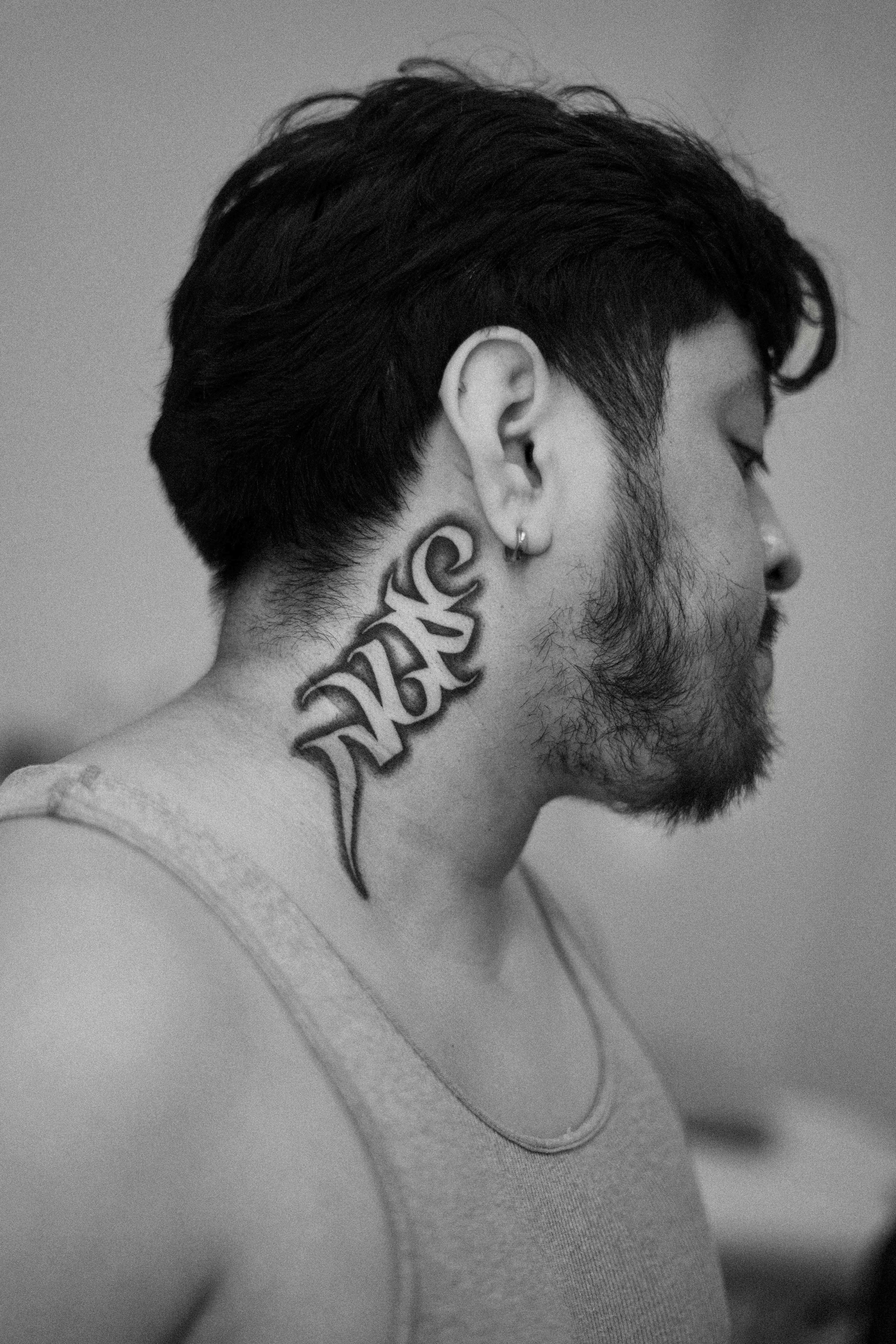 Tattoo lettering face