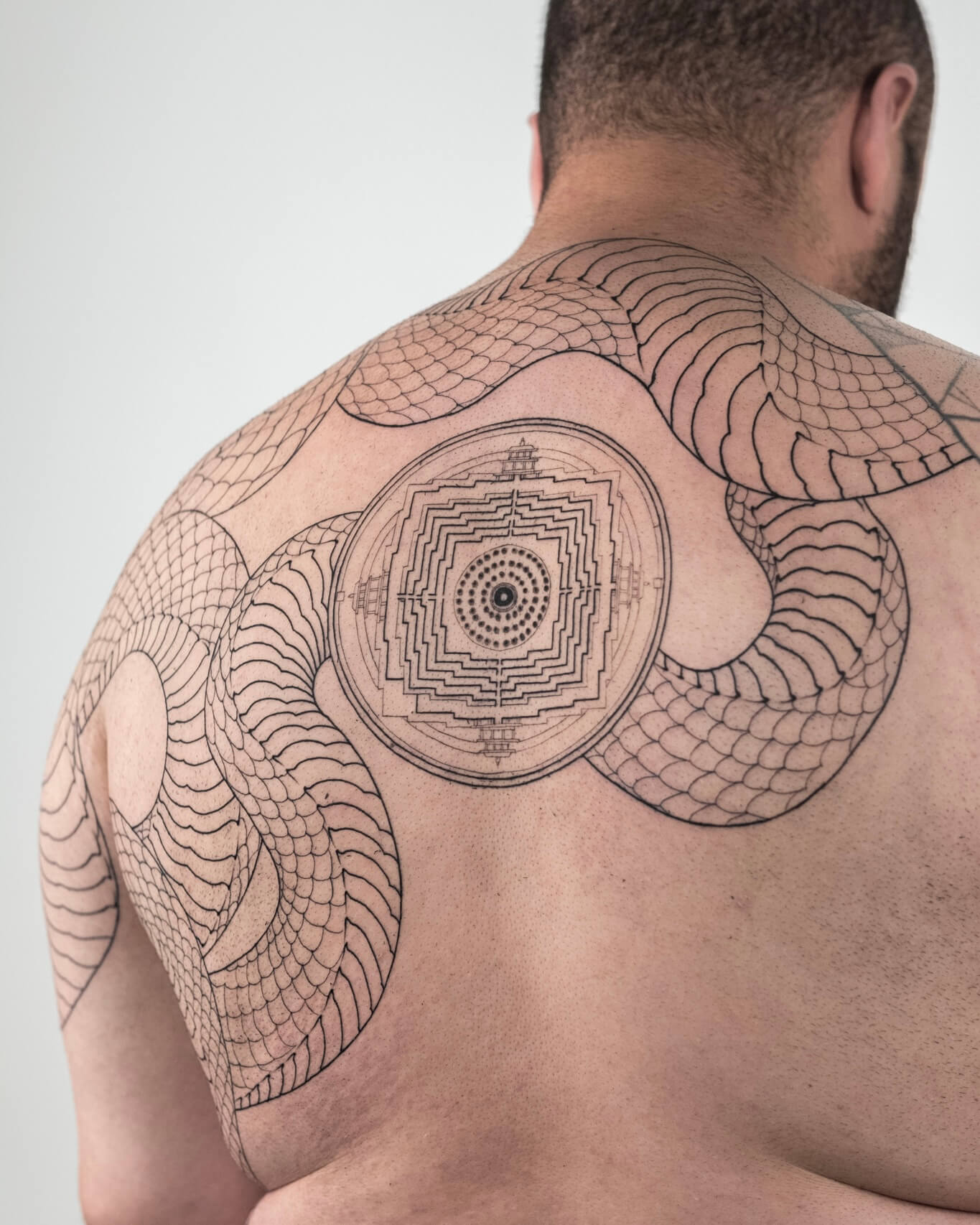 Snake Tattoo Meaning: Symbolism, Designs & Ideas