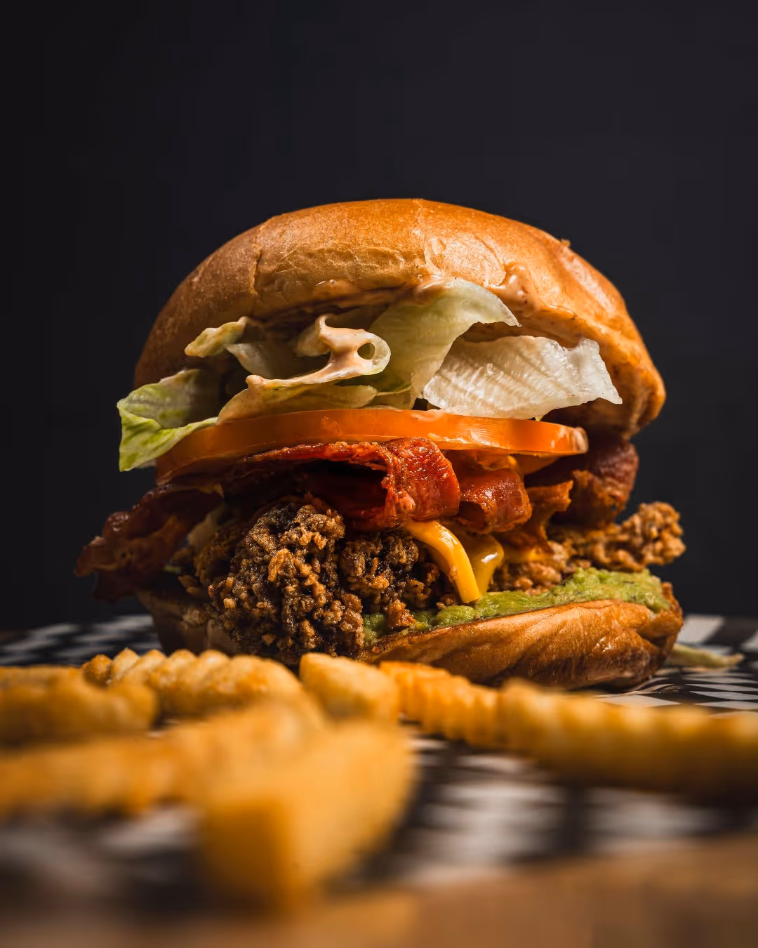 The Malibu Club - Fried buttermilk chicken breast, crushed avocado, bacon, cheddar, lettuce, tomato, chipotle mayo, brioche bun. Hungry yet?

 #MalibuClub #ButtermilkChicken #Foodie #GourmetBurgers #FoodLovers #BaconLover #AvocadoToast #CheddarCheese