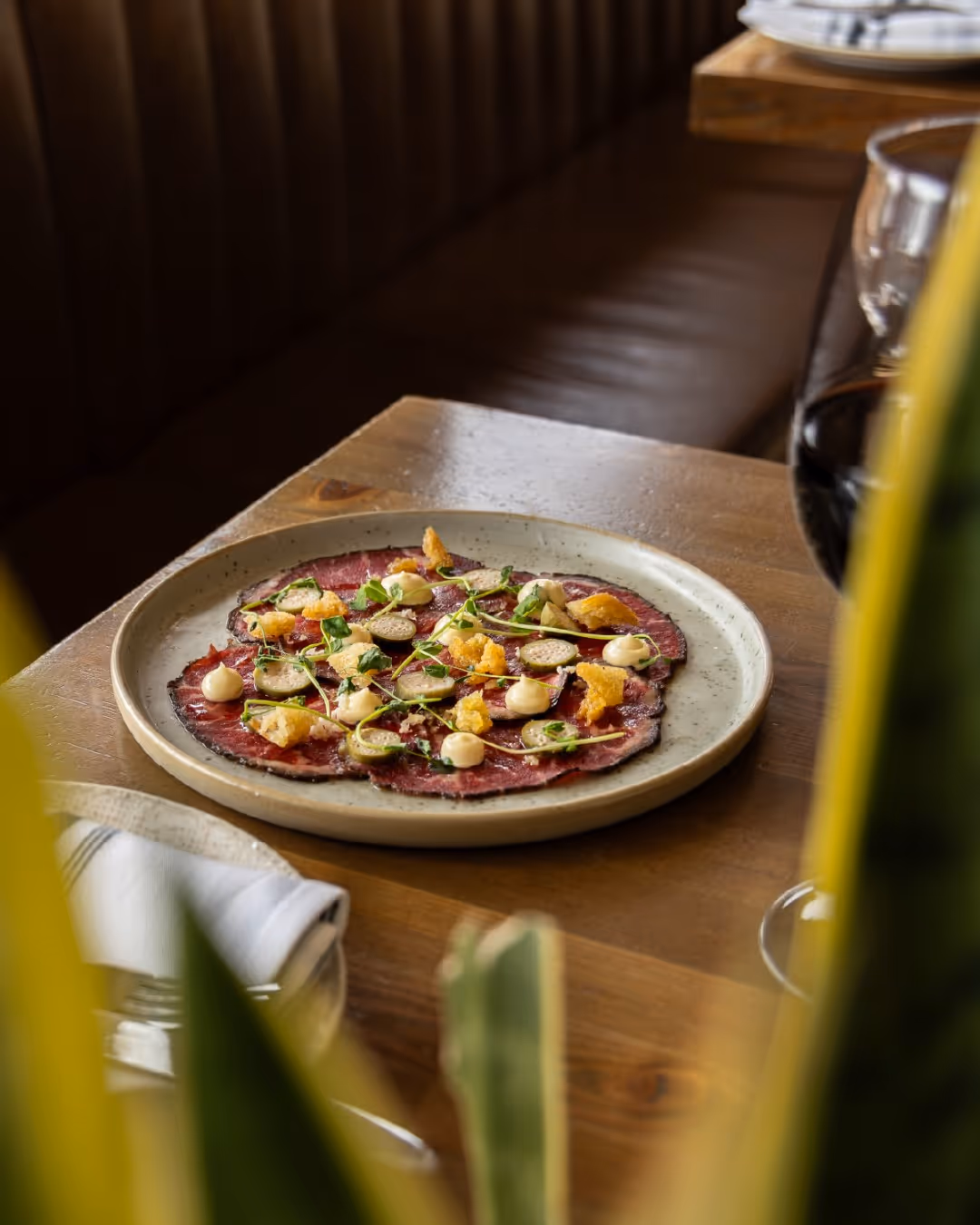 Prime Beef Carpaccio, reimagined for spring.

Topped with meyer lemon aïoli, caper berries, horseradish, and crisp croutons—this seasonal appetizer brings balance and boldness to the table.

Part of our $39 Spring Fling menu—reserve your table now, link in bio.

#TheBisonBanff #LocalFlavours #BanffDining #RegionalSeasonalCuisine #BanffSpecials