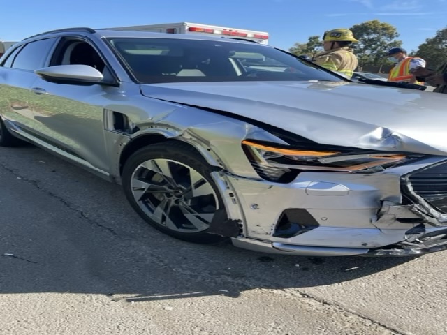 Front-end damage to silver SUV after a highway collision in Santa Ana, California. Photo used for $250K automobile accident settlement case by California Attorney Group.