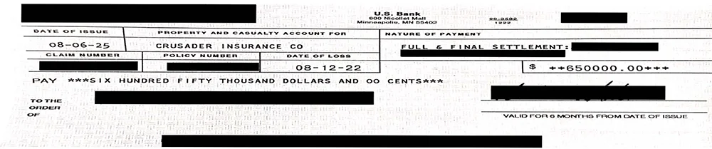 A settlement check for $650,000